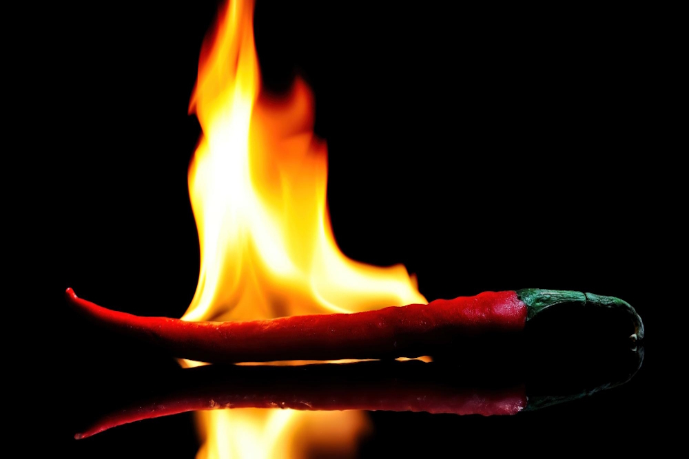 Chili-Schote brennt