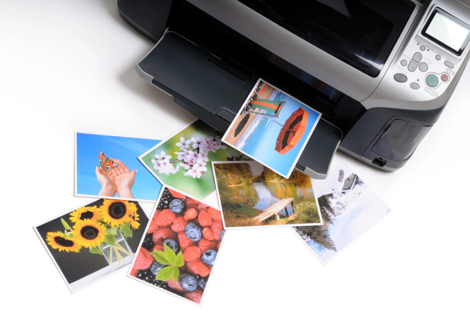 Drucker, der viele Fotos gedruckt hat / Symbolbild: viele Fotos drucken