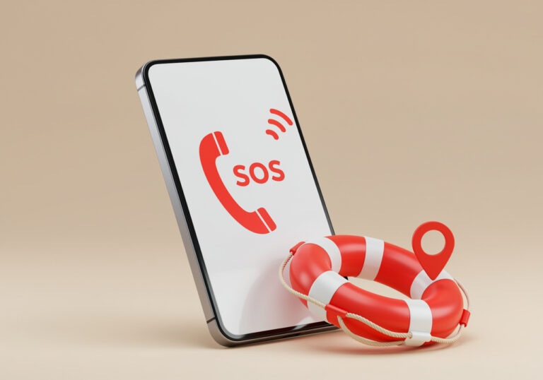 Smartphone mit rotem SOS-Symbol und Rettungsring mit Standortmarker davor.